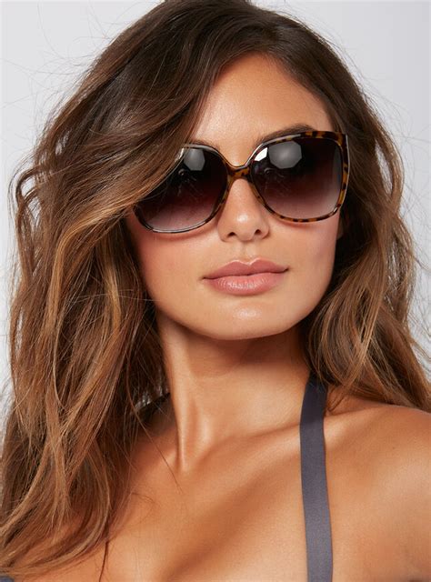 oversized tortoise shell sunglasses.